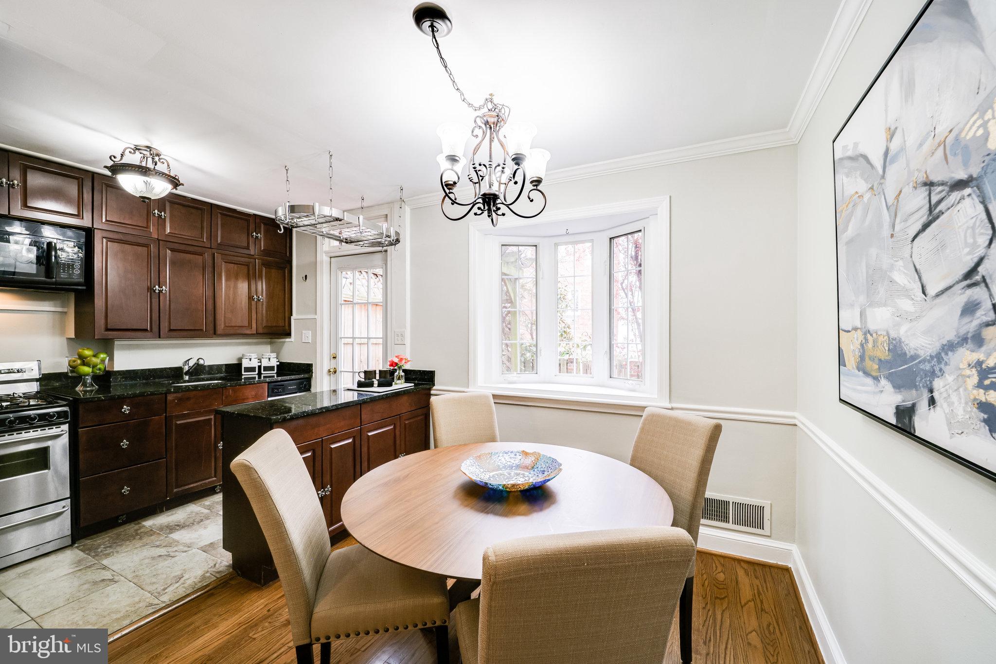 1126 Portner Road Alexandria, VA 22314 - Photo 7 of 26 Bright dining room with bay window to backyard
