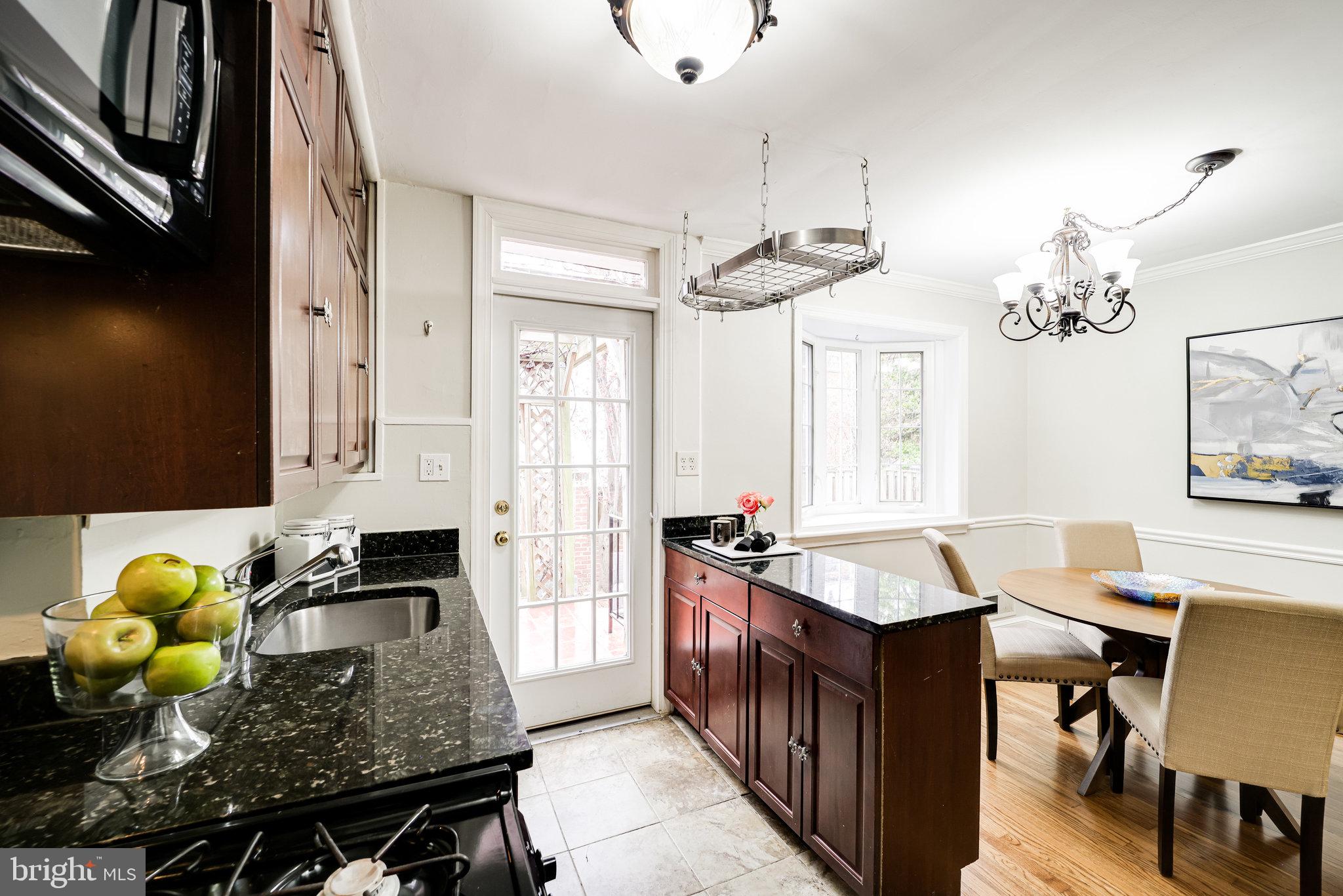 1126 Portner Road Alexandria, VA 22314 - Photo 8 of 26 Open kitchen, peninsula great for meal prep