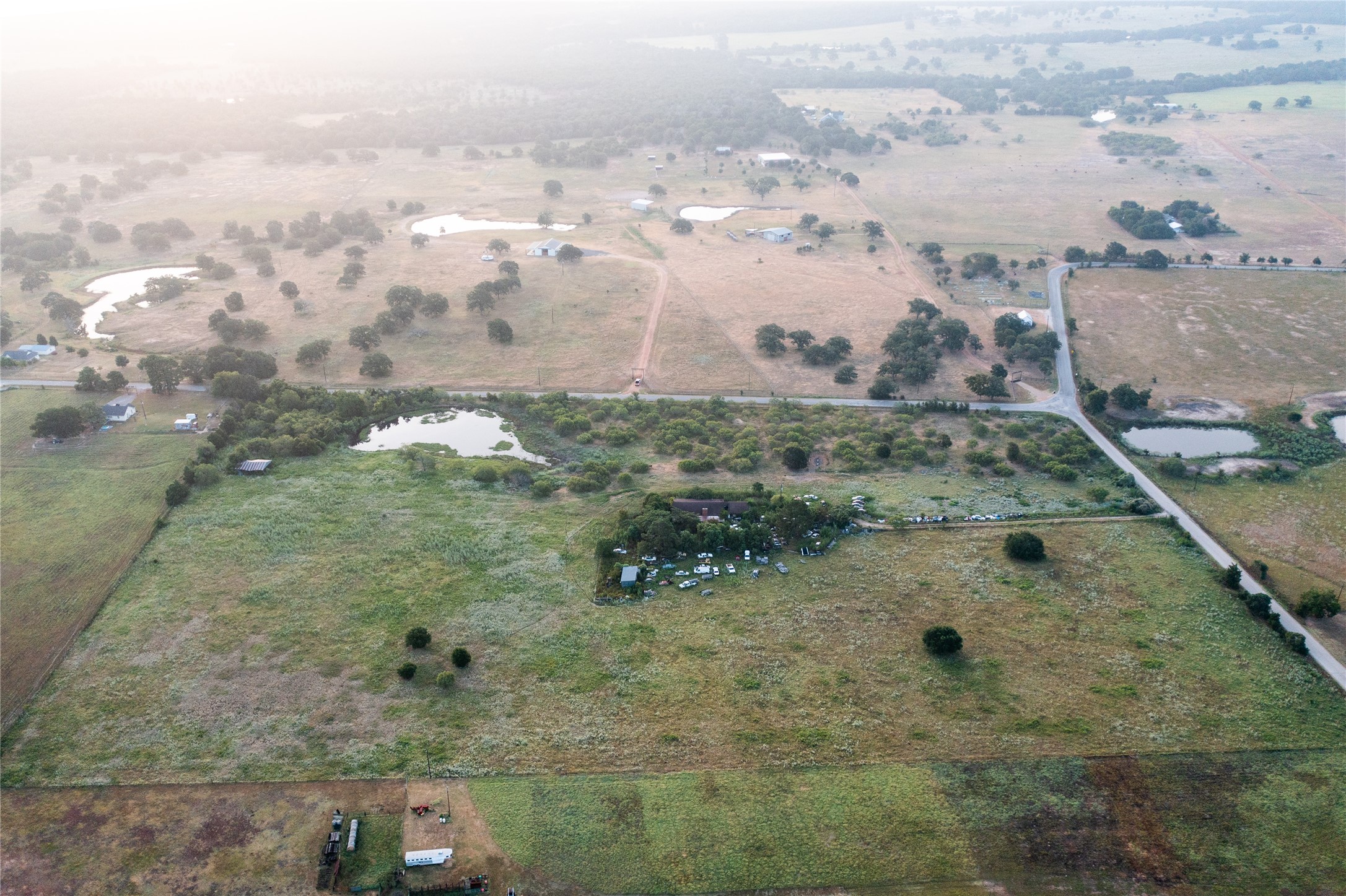 Tbd Young School House Road Smithville, TX 78957 - Photo 10 of 14 an aerial view of residential houses with outdoor space