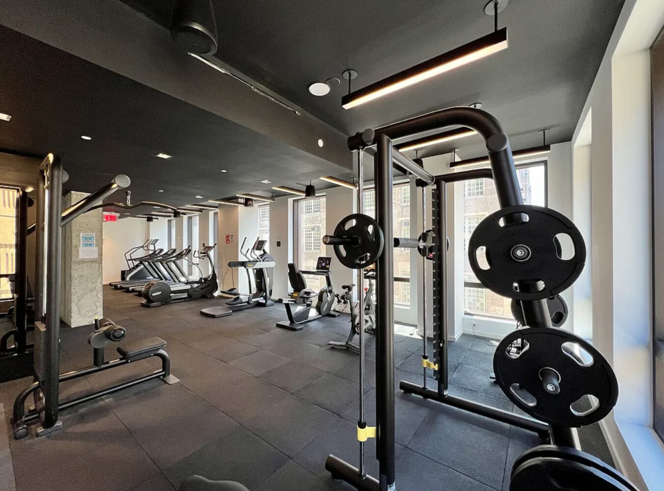 242 Broome Street, Unit 10B Manhattan, NY 10002 - Photo 7 of 10 a view of a room with gym equipment