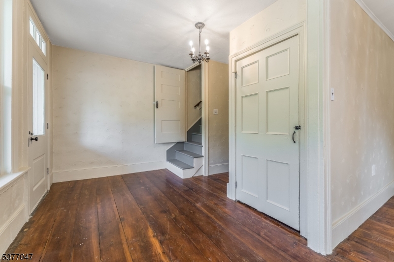 7080 Lt York-mtpleasant Milford, NJ 08848 - Photo 11 of 30 wooden floor in an empty room with a window