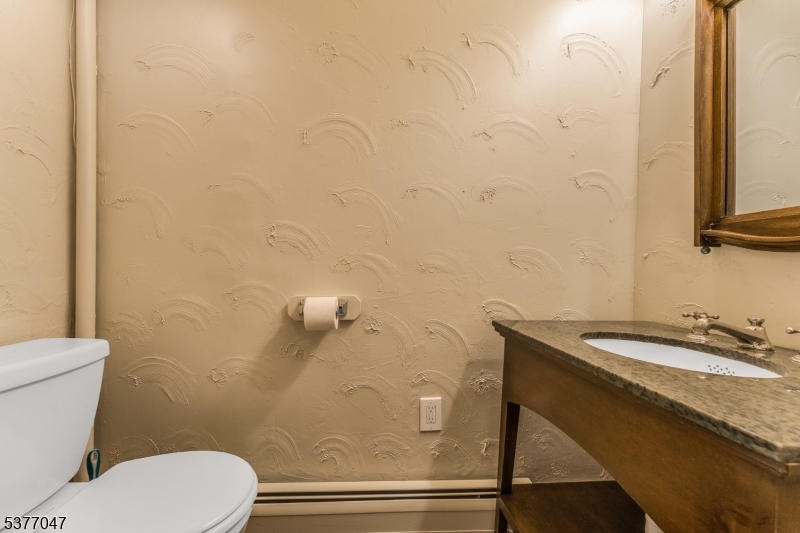 7080 Lt York-mtpleasant Milford, NJ 08848 - Photo 12 of 30 a bathroom with a granite countertop toilet and a sink