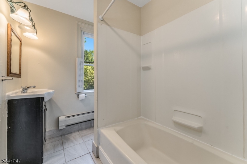 7080 Lt York-mtpleasant Milford, NJ 08848 - Photo 13 of 30 a bathroom with a bathtub