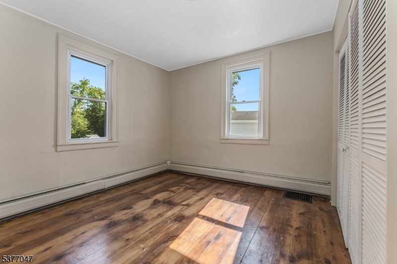 7080 Lt York-mtpleasant Milford, NJ 08848 - Photo 14 of 30 wooden floor in an empty room with a window