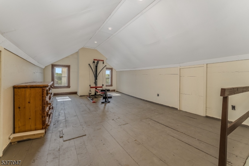 7080 Lt York-mtpleasant Milford, NJ 08848 - Photo 21 of 30 a view of a livingroom with hardwood floor and a ceiling fan