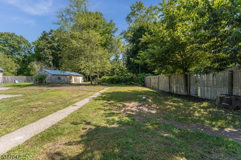 7080 Lt York-mtpleasant Milford, NJ 08848 - Photo 24 of 30 a view of a backyard with trees