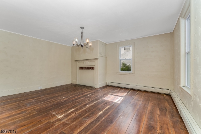 7080 Lt York-mtpleasant Milford, NJ 08848 - Photo 10 of 30 wooden floor in an empty room with a window