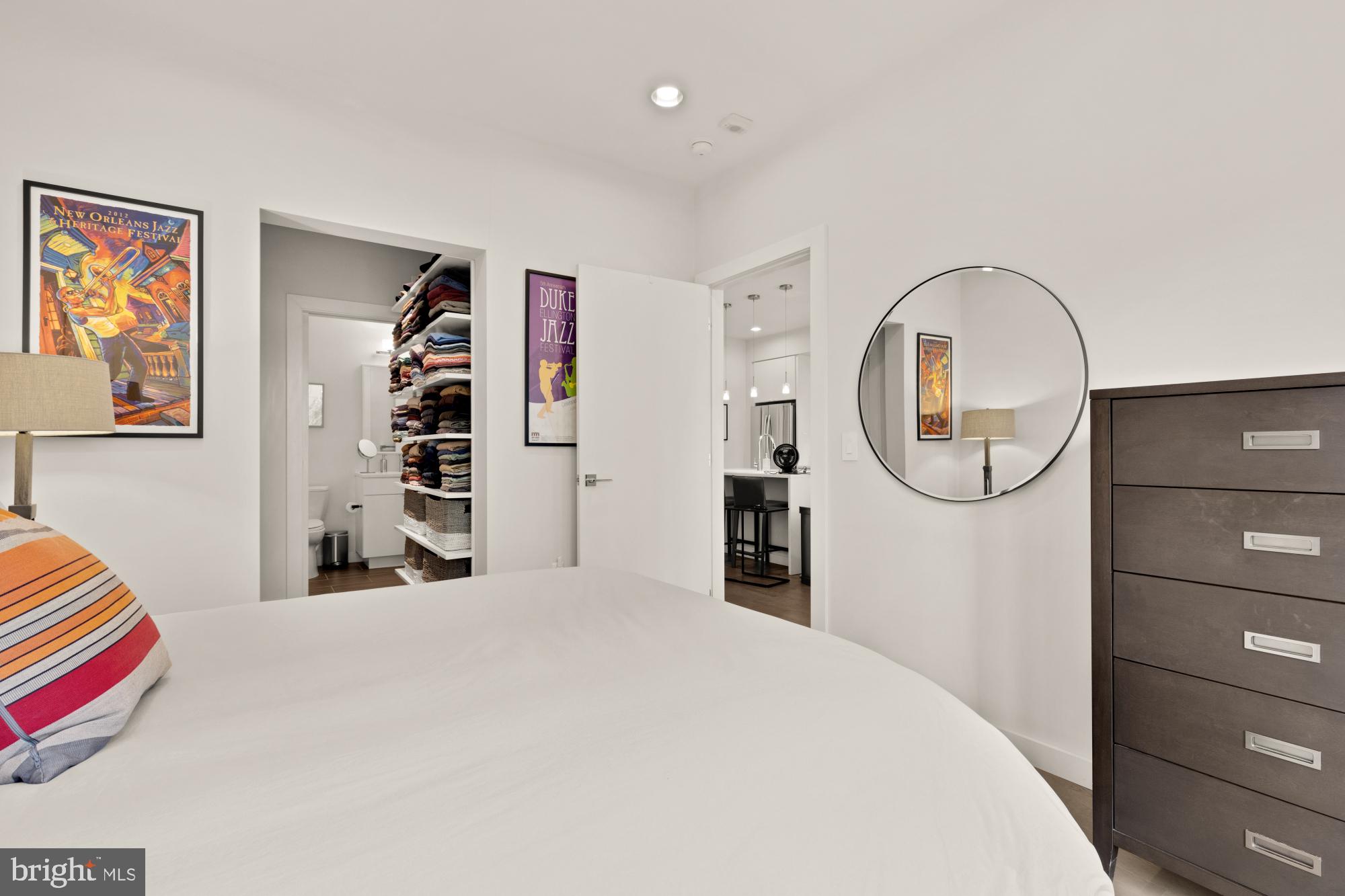 1405 W Street Northwest, Unit 203 Washington, DC 20009 - Photo 13 of 20 a bedroom with a bed and a cabinets
