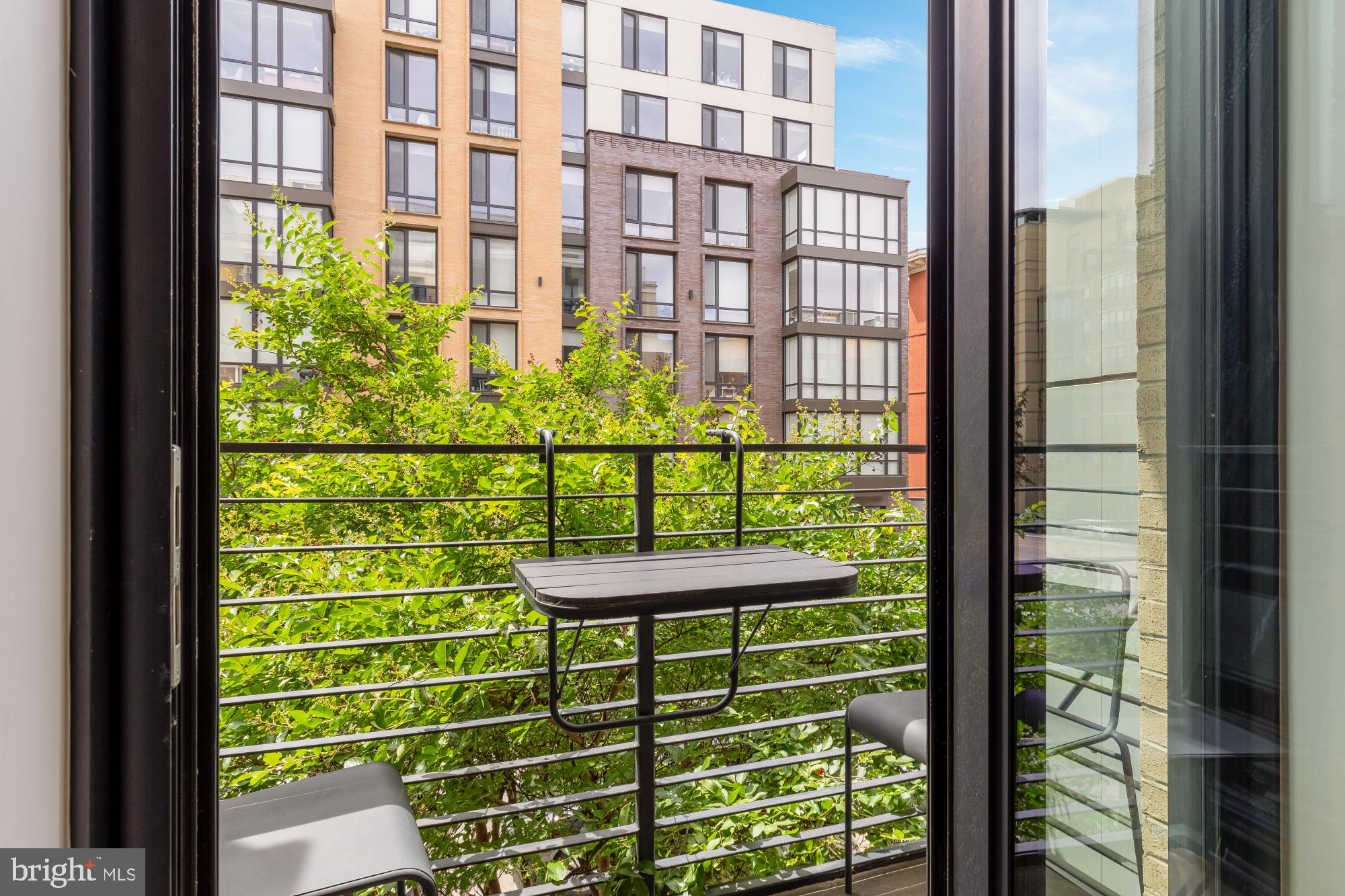 1405 W Street Northwest, Unit 203 Washington, DC 20009 - Photo 14 of 20 a view of a building from a window