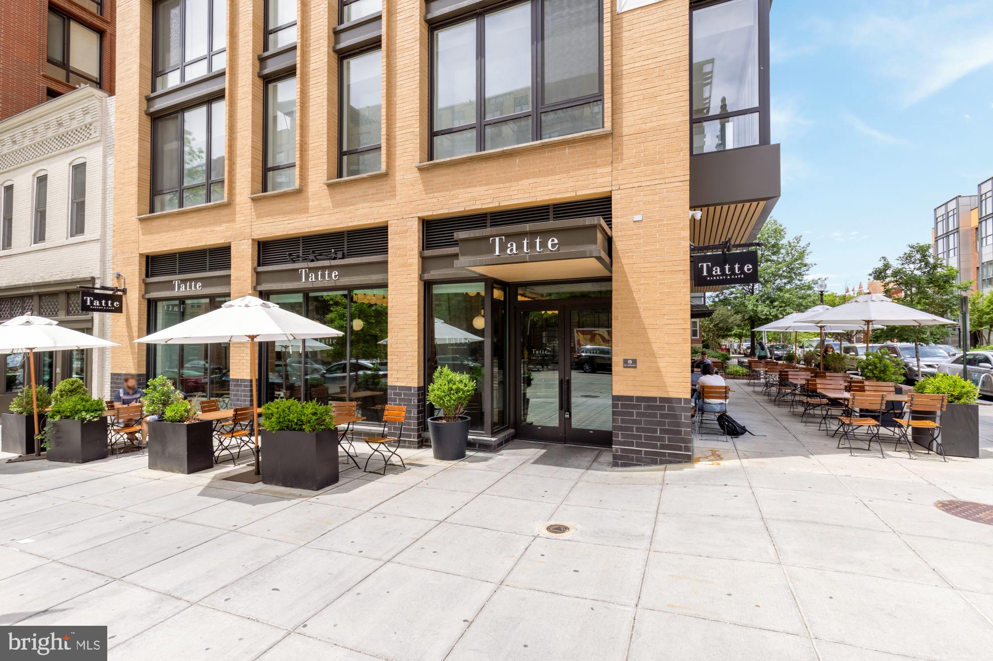 1405 W Street Northwest, Unit 203 Washington, DC 20009 - Photo 19 of 20 a view of a building with potted plants