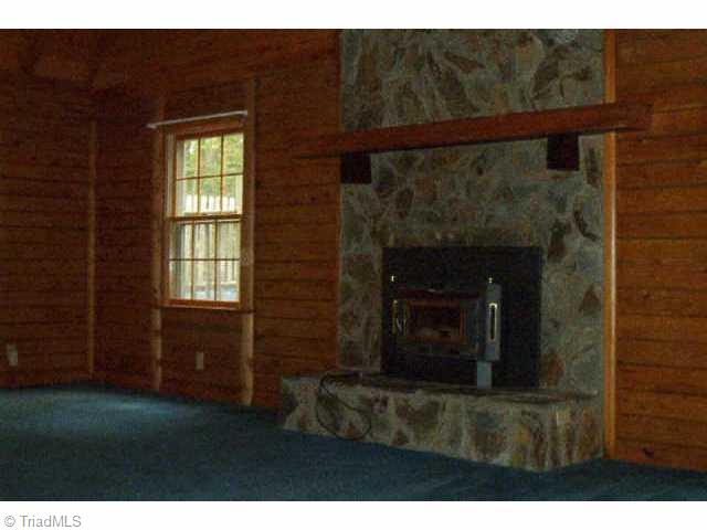5006 Golden Acres Road Oak Ridge, NC 27310 - Photo 2 of 9 Other. 25 x 16 Great Room Features Stone Fireplace and Opens to Deck