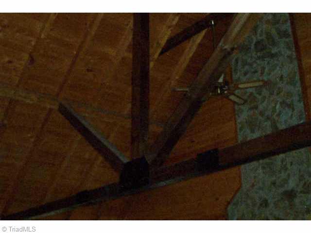 5006 Golden Acres Road Oak Ridge, NC 27310 - Photo 3 of 9 Other. Great Room Has Vaulted Open Beamed Ceiling, Fan and Open Dormer.