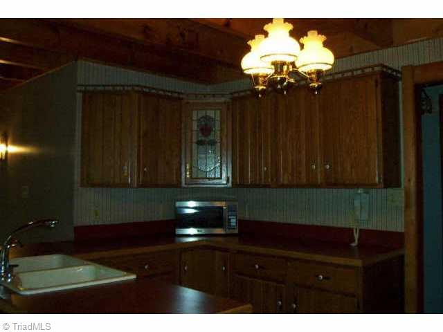 5006 Golden Acres Road Oak Ridge, NC 27310 - Photo 5 of 9 Other. Large Eat-in Kitchen w/Pantry and Glass Decor Cabinet Insert