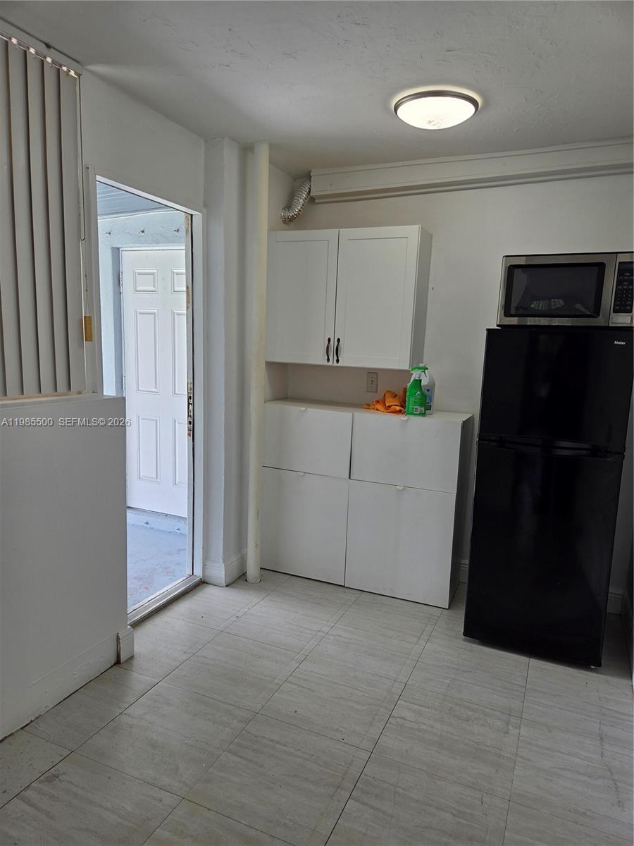 29420 Southwest 152nd Avenue, Unit 2 Homestead, FL 33033 - Photo 4 of 8 Entry on the back