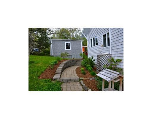321 Highway 32 Chamberlain, ME 04541 - Photo 3 of 11 Exterior Front. lovely landscaping...