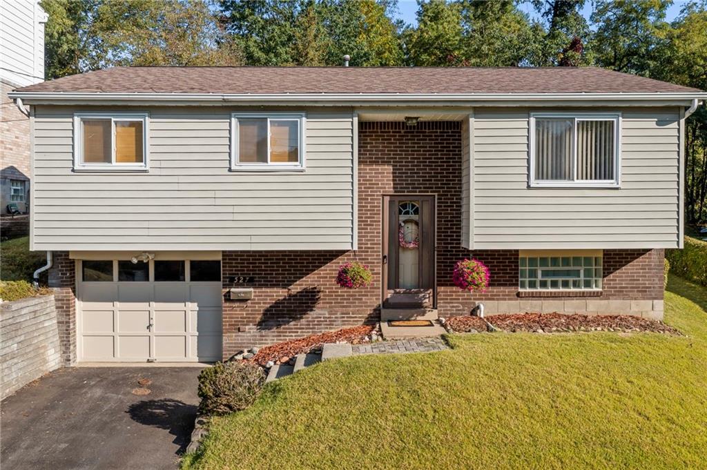 a house view with a backyard space