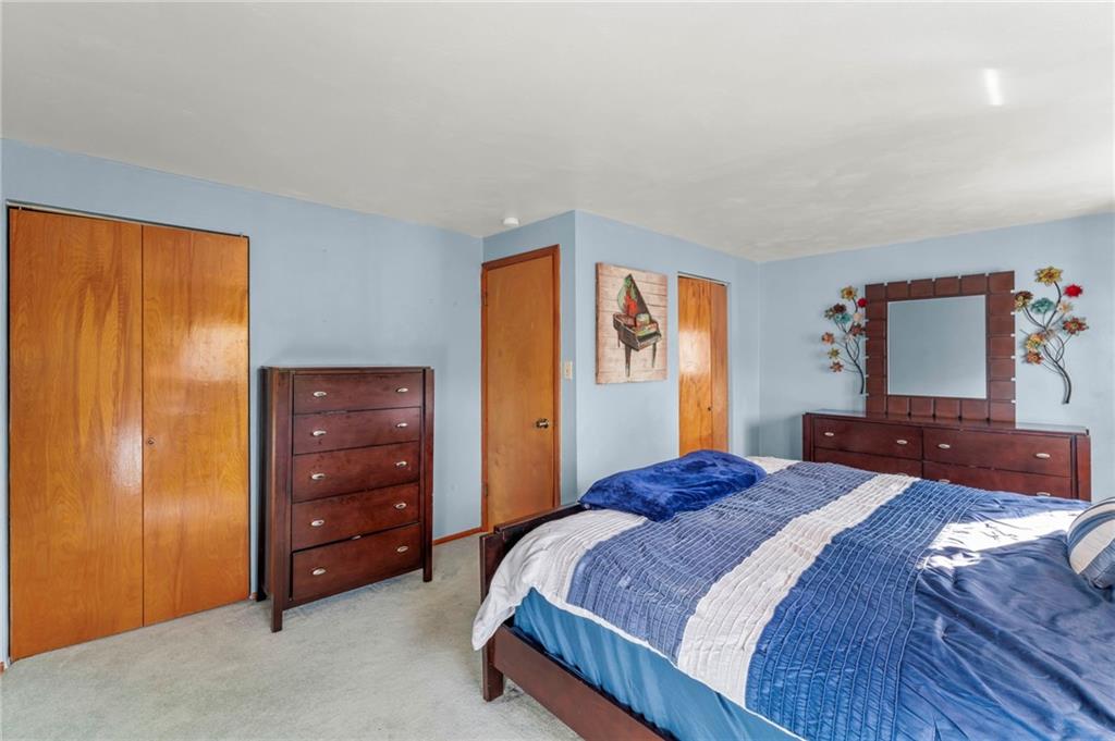 527 Pointview Road Pittsburgh, PA 15227 - Photo 13 of 25 a bedroom with a bed and a dresser