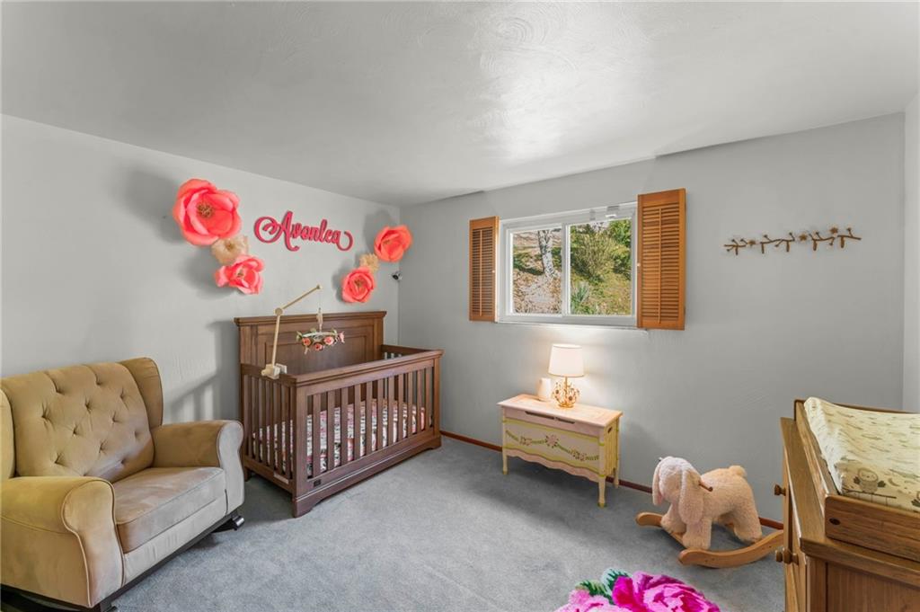 527 Pointview Road Pittsburgh, PA 15227 - Photo 14 of 25 a bedroom with furniture and a couch