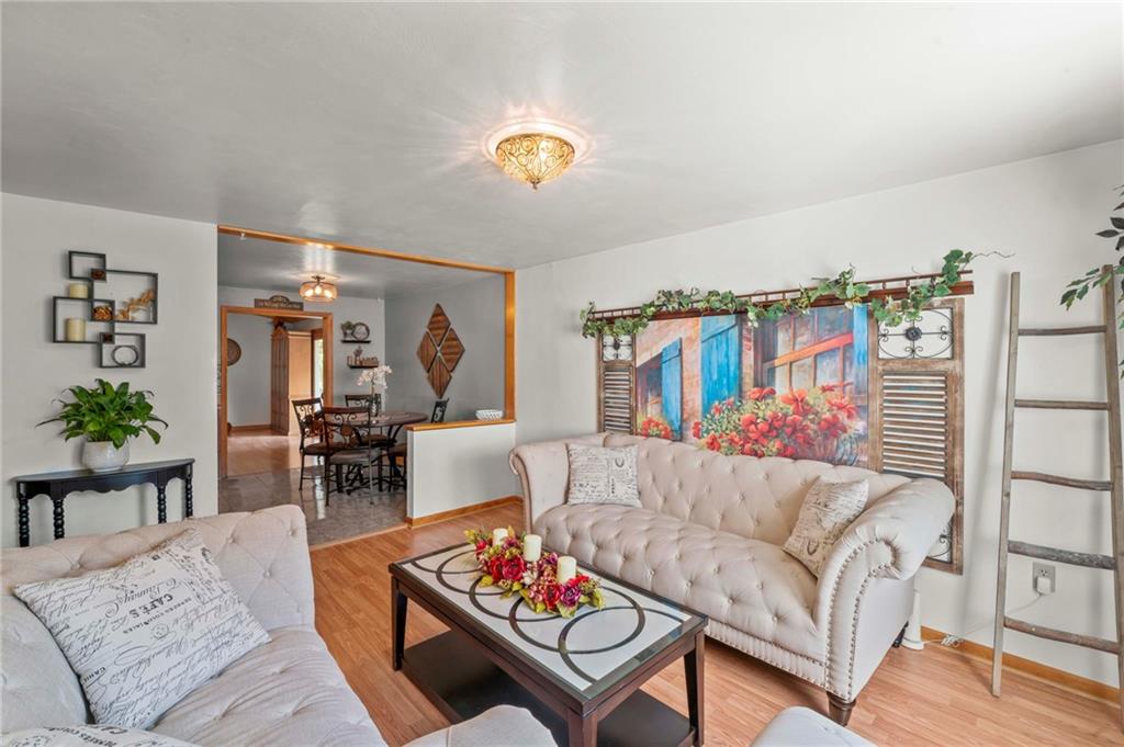 527 Pointview Road Pittsburgh, PA 15227 - Photo 9 of 25 a living room with furniture and a table