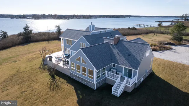a kitchen with stainless steel appliances sink a microwave and cabinets