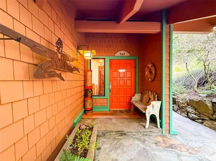a backyard of a house with seating space