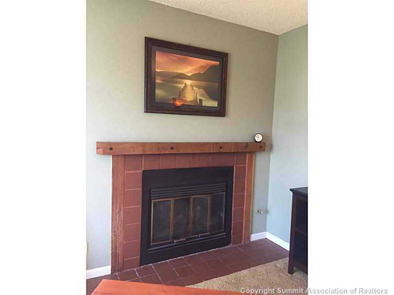 570 Bills Ranch Road, Unit A165 Frisco, CO 80443 - Photo 12 of 23 a living room with a fireplace