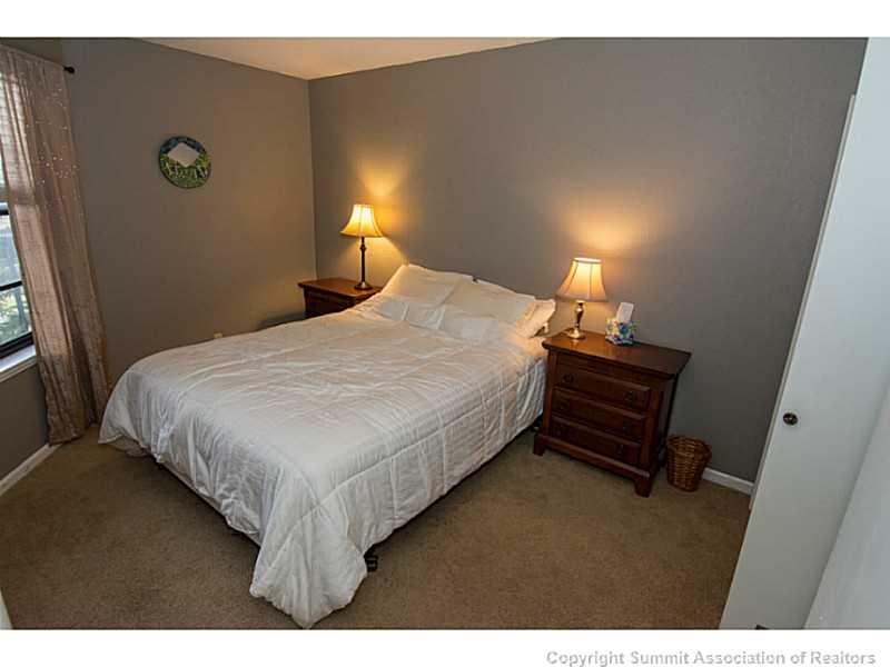 570 Bills Ranch Road, Unit A165 Frisco, CO 80443 - Photo 5 of 23 a bedroom with a bed and a lamp