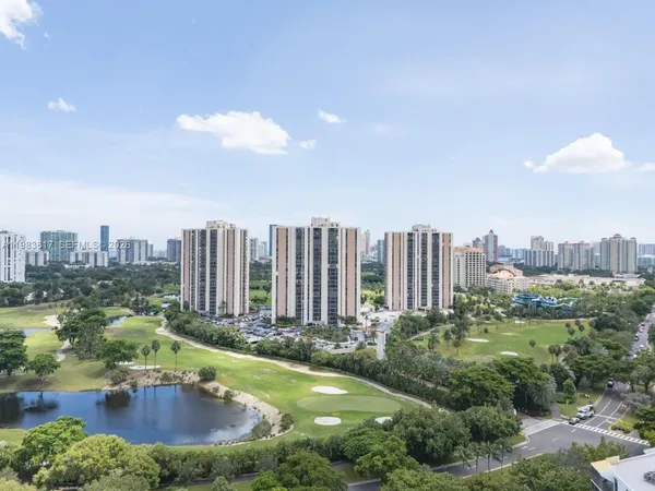 a view of a city with tall buildings