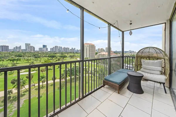 a view of roof deck with furniture
