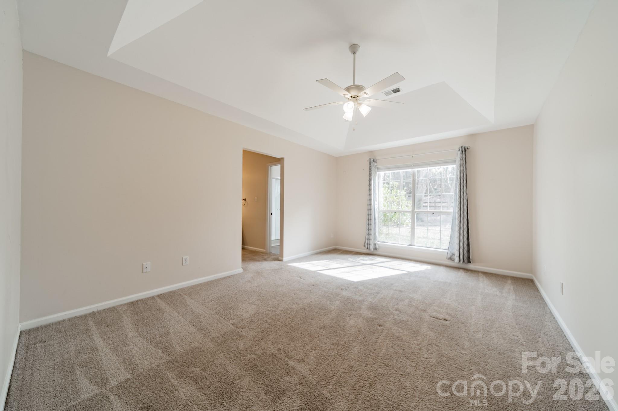 9409 Cedar River Road Huntersville, NC 28078 - Photo 26 of 31 a view of an empty room with a window