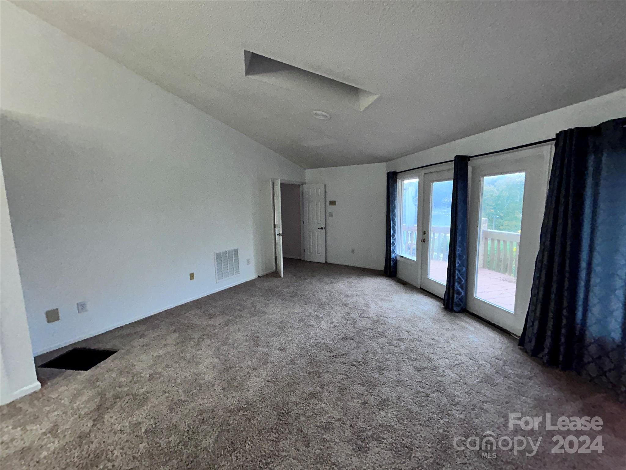 256 Spring Run Road Mooresville, NC 28117 - Photo 17 of 37 a view of an empty room with a window