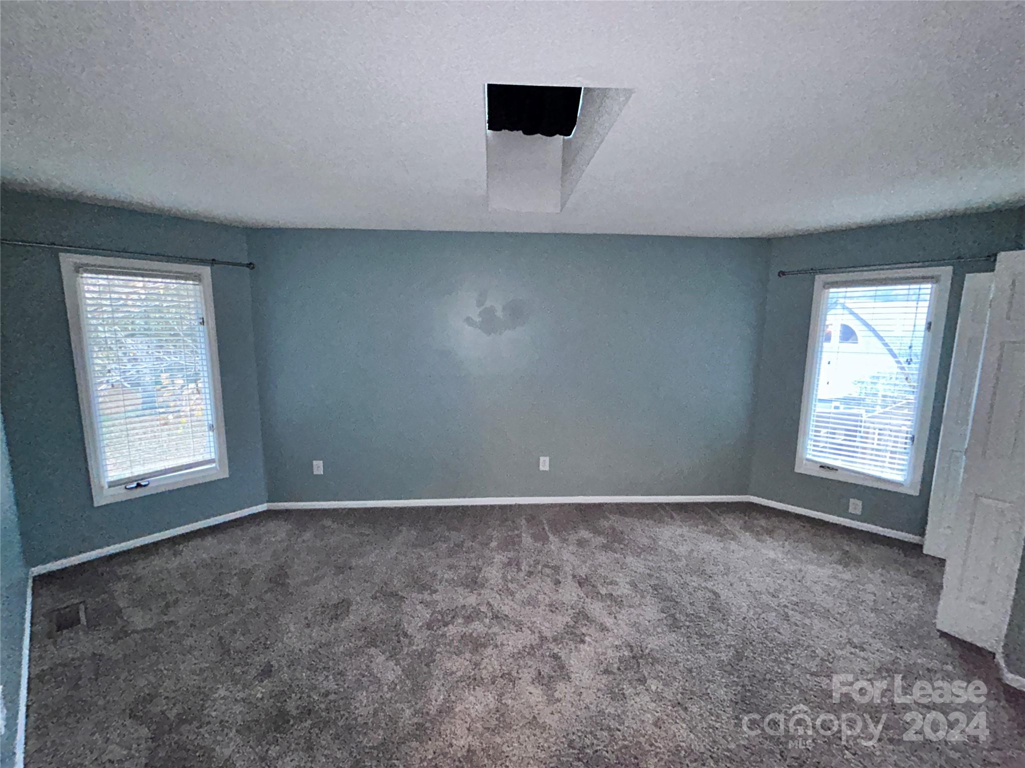 256 Spring Run Road Mooresville, NC 28117 - Photo 18 of 37 an empty room with windows