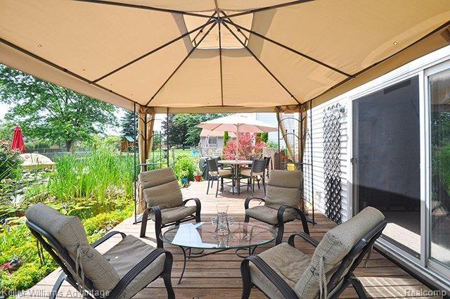 42119 Loganberry Ridge North Novi, MI 48375 - Photo 22 of 25 22_BackDeck_1-2.jpg