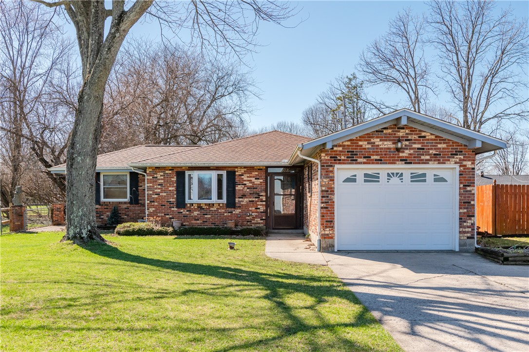 5760 Kitridge Road Dayton, OH 45424 - Photo 2 of 19 This charming brick home offers inviting curb appeal and a convenient attached garage.