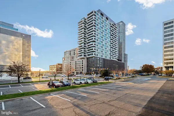 a city street lined with buildings and cars