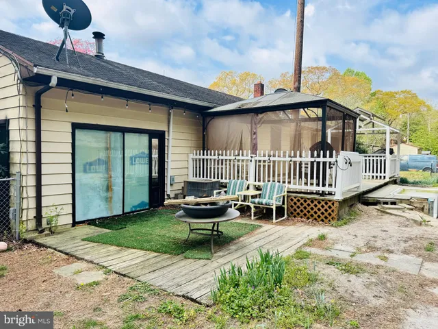 a view of a chair with a table in the patio
