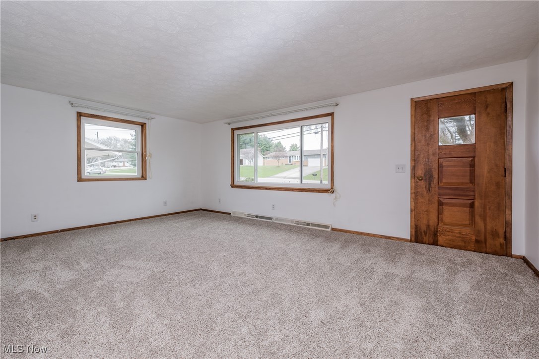 3615 Rolling Ridge Road Northeast Canton, OH 44721 - Photo 10 of 19 New Carpet, Newer windows. front door.