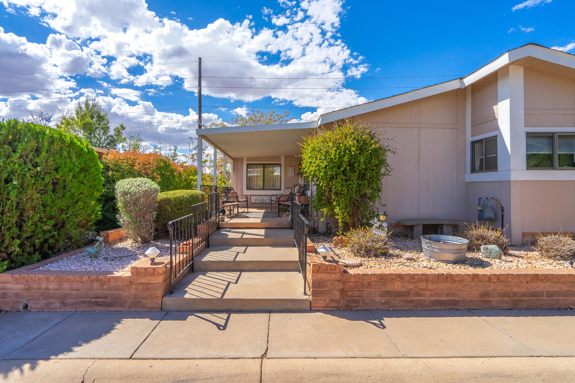 1526 North Dixie Downs Road, Unit 42 St. George, UT 84770 - Photo 1 of 1 Front of home / porch