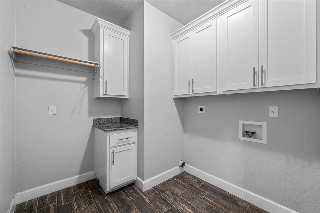 2662 Snow Road Kempner, TX 76539 - Photo 29 of 40 a view of cabinets and wooden floor