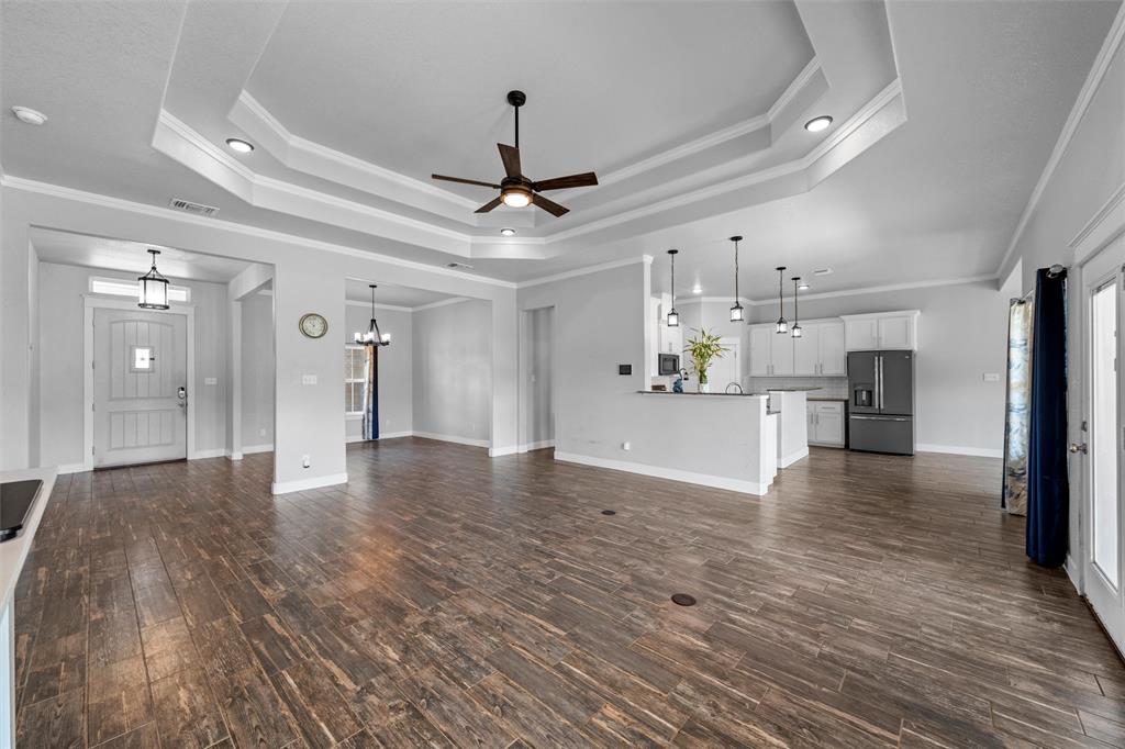 2662 Snow Road Kempner, TX 76539 - Photo 8 of 40 a view of a kitchen with a refrigerator and a stove top oven
