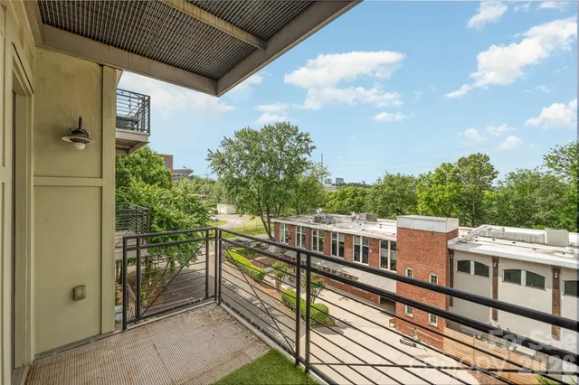 a view of a swimming pool with a garden