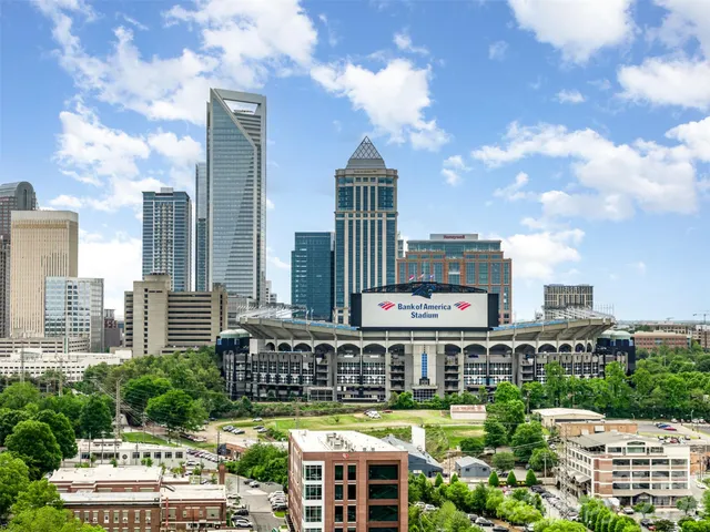 a view of a city with tall buildings