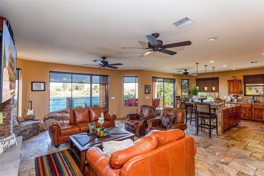 4654 My Place Road Needles, CA 92363 - Photo 74 of 75 a living room with furniture kitchen view and a large window