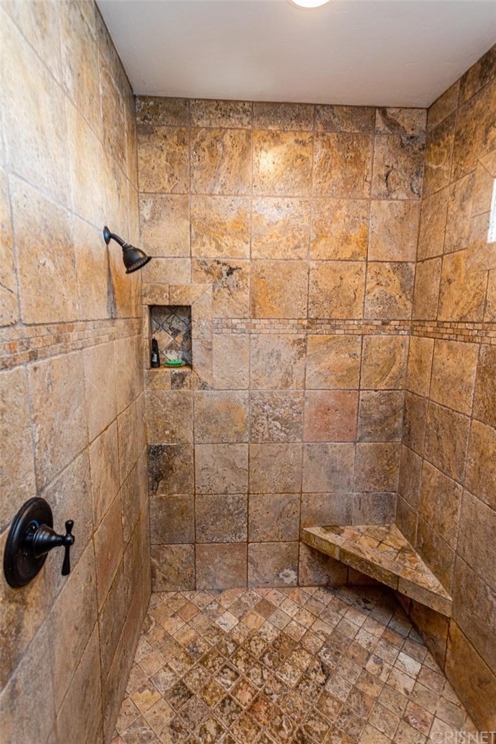 4654 My Place Road Needles, CA 92363 - Photo 31 of 75 Master Bath Walk-in shower highlighting built-in shelving and custom tile.