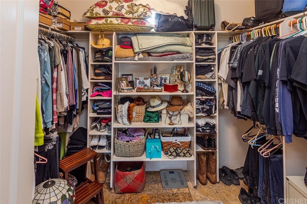 4654 My Place Road Needles, CA 92363 - Photo 32 of 75 a view of walk in closet with clothes and shoes