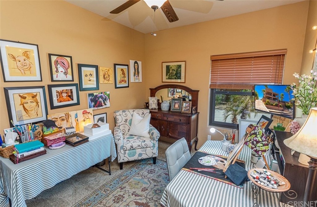 4654 My Place Road Needles, CA 92363 - Photo 35 of 75 a living room with furniture a rug and a window