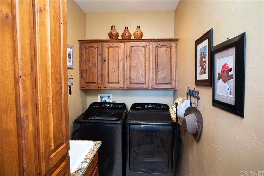 4654 My Place Road Needles, CA 92363 - Photo 37 of 75 a kitchen with stainless steel appliances granite countertop a refrigerator and a stove