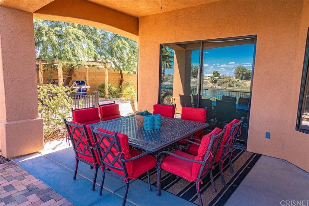 4654 My Place Road Needles, CA 92363 - Photo 42 of 75 a view of a dining room with furniture window and wooden floor