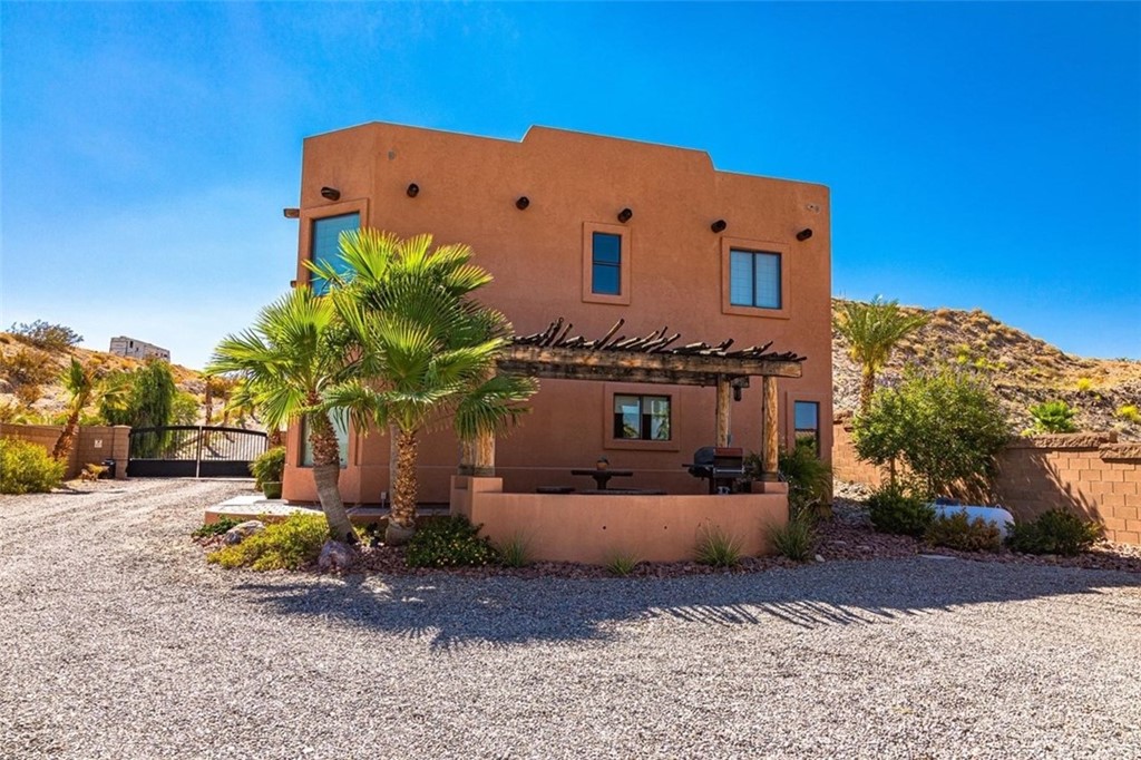 4654 My Place Road Needles, CA 92363 - Photo 45 of 75 a view of a house with backyard and sitting area