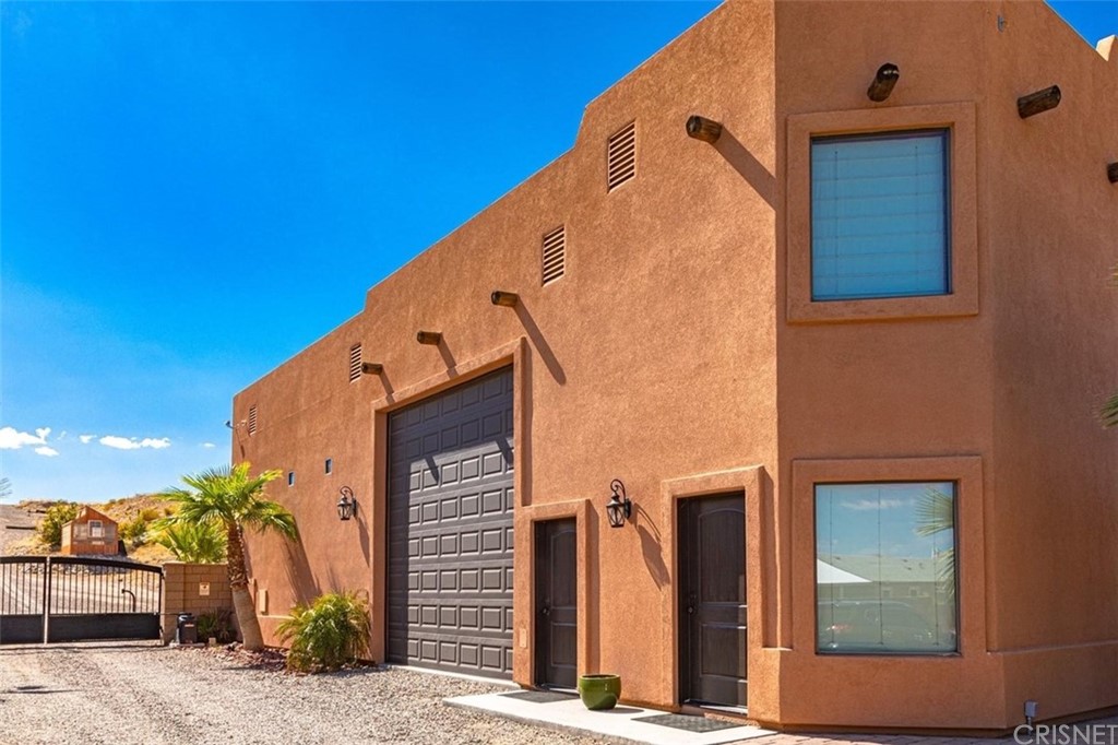 4654 My Place Road Needles, CA 92363 - Photo 46 of 75 Casita exterior highighting front entrance and entry to one of the Large Garages